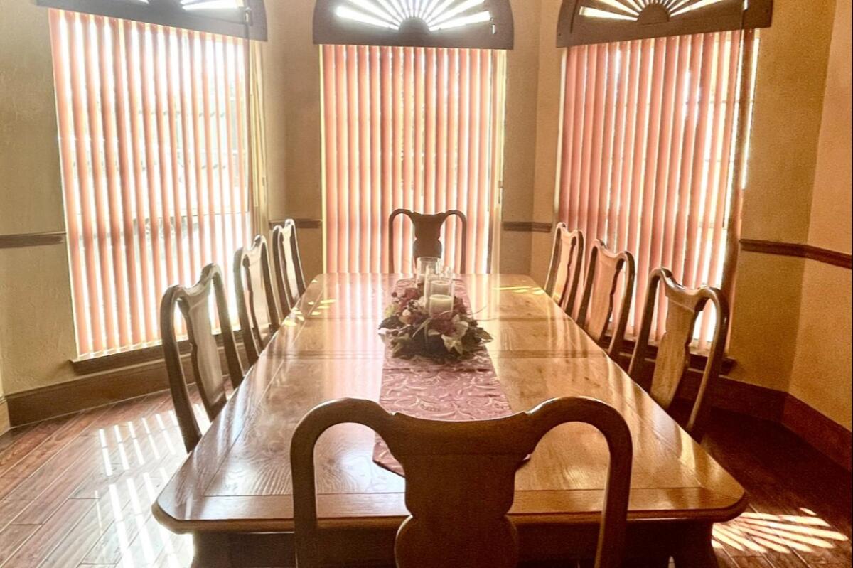 formal dining room rehearsal dinner gatheirng